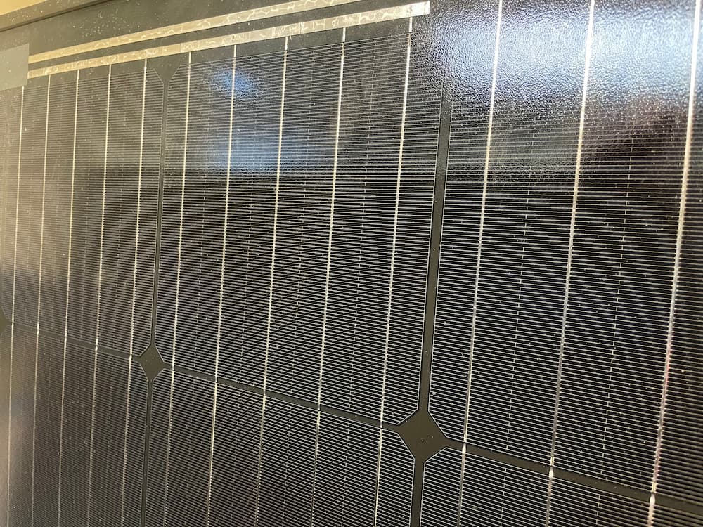 Clearly depicts various solar cell fingers and busbars on a solar panel